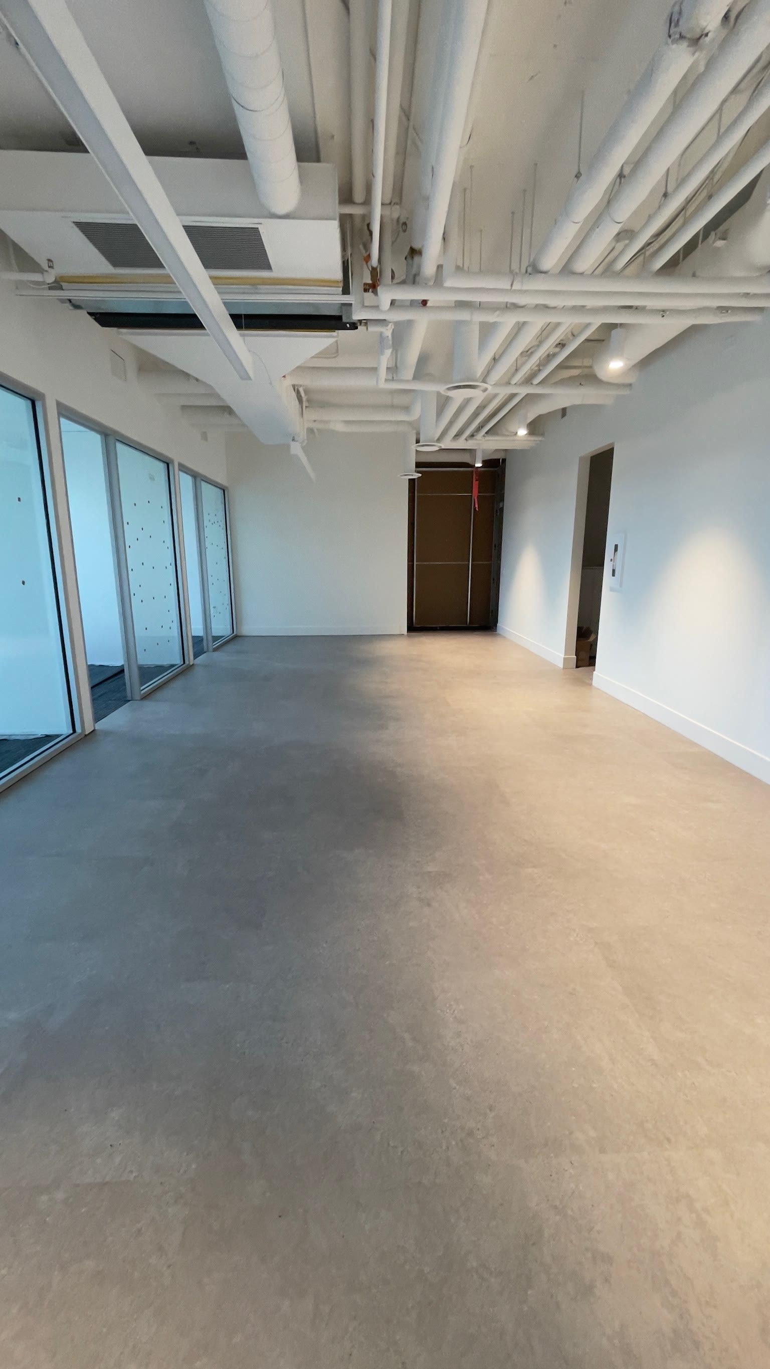 Bright commercial office with luxury vinyl tile flooring — installed by Becker Flooring in Penticton