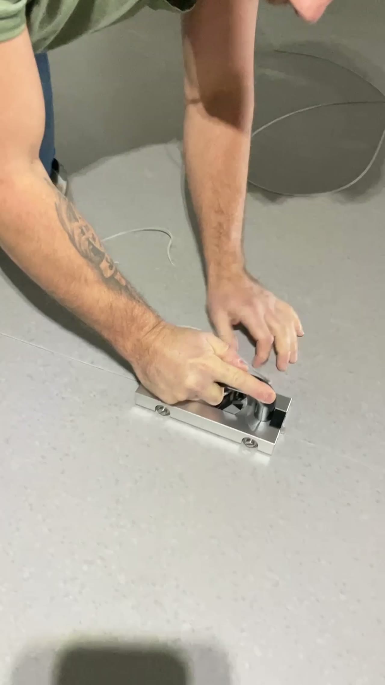 Kelowna Garage — Epoxy Floor System — epoxy application in progress, Kelowna